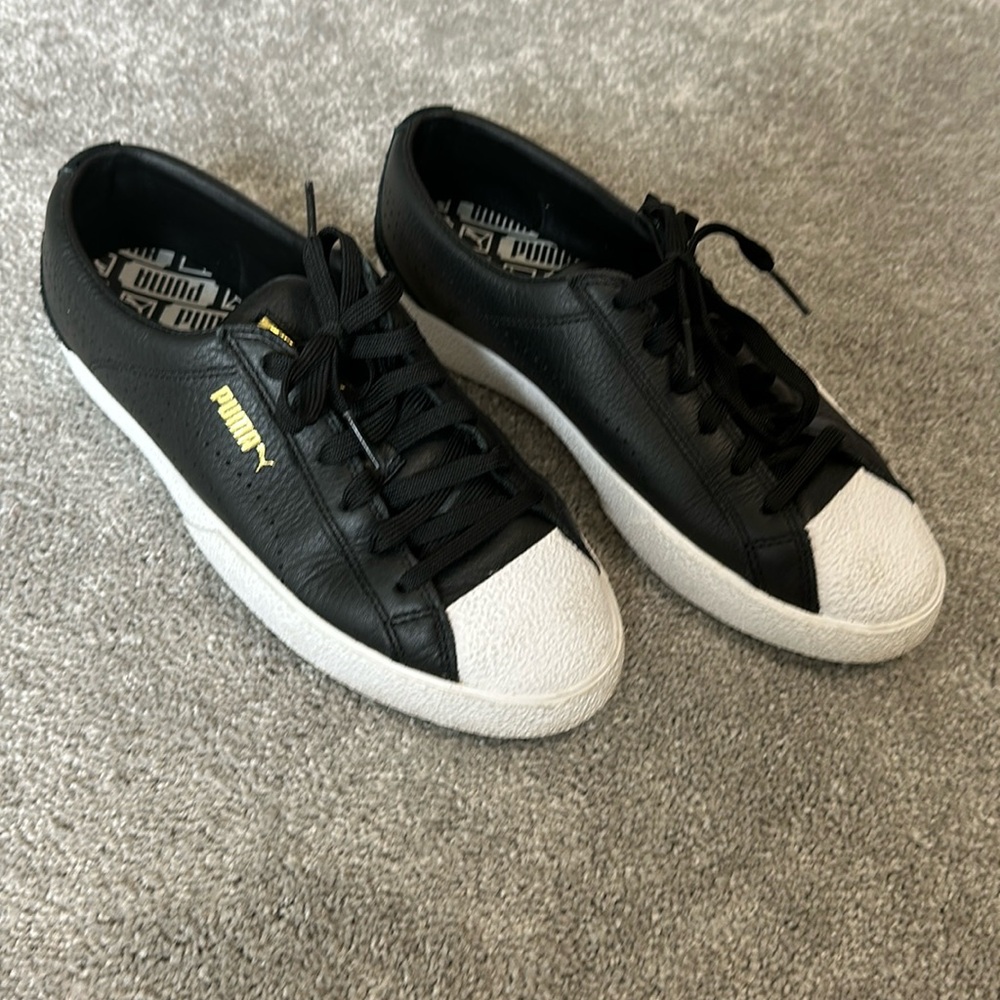 Black and white puma sneakers